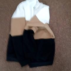 Vestje Wit-bruin-zwart, a été signalé par Centraal magazijn utilisant iLost