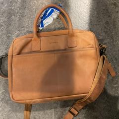 حقيبة يد op naam van Spel، كما تم الإبلاغ عنه بواسطة Gemeente Amsterdam عبر iLost