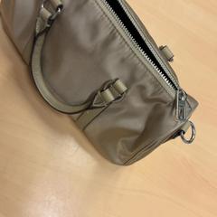 Bolso de dama, segundo informou RET usando iLost