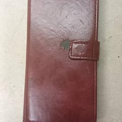 Smarthphone Bordeaux rood hoesje Samsung, como reportado por Qbuzz GD Groningen Peizerweg utilizando o iLost