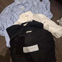 Clothes & Tshirt blue. black. white, as reported by The Dominican using iLost