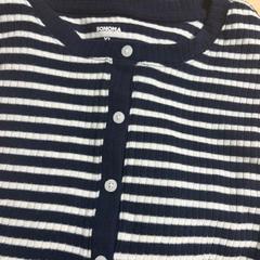 Maglione, come riportato da DoubleTree by Hilton Rotterdam Centre utilizzando iLost