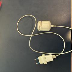 Apple Airpods, 1 earbud, charger, as reported by MEININGER Hotel Munich Olympiapark using iLost