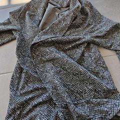 Kläder jas, rapporterat av Regio Oost-Vlaanderen med iLost