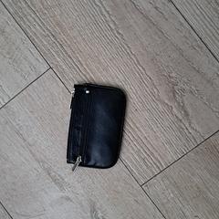 Zwart portemonneetje, som rapporterats till iLost