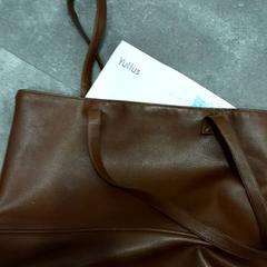 Bag brief Yulius, as reported by Qbuzz DMG using iLost