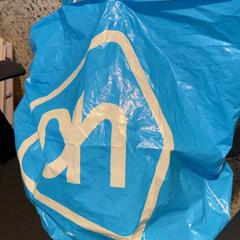Plastpåse AH tas plastic, rapporterat av Designer Outlet Roermond med iLost