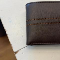 Peněženky ten Broecke, jak nahlášeno HTM pomocí iLost