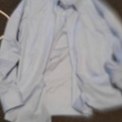 Camisa overhemd licht blauw, segons ha informat Van der Valk Hotel Tiel mitjançant iLost