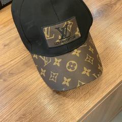 Gorra de béisbol, segundo informou MEININGER Hotel Marseille Centre la Joliette usando iLost