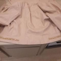 Chaqueta Leer roze, segundo informou Van der Valk Hotel Schiphol usando iLost