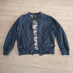 Jas, zoals gemeld door Amsterdam ID Aparthotel met iLost