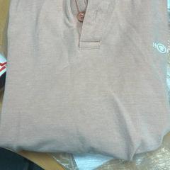 Chemise polo, a été signalé par Sheraton Brussels Airport Hotel utilisant iLost