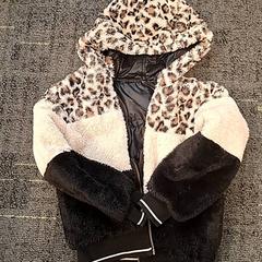 Jas Zwart/wit en tijgerpatroon, zoals gemeld door Connexxion Noord Holland Noord Hoorn met iLost