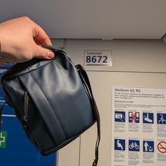 Donker groene of donker blauw schoudertas, gerapporteerd met iLost