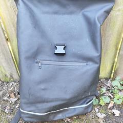 Zwarte rugzak (merk Unique), segundo informou a iLost