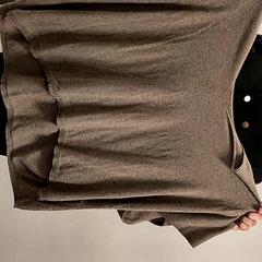 Maglione & Veste bruin, come riportato da Koninklijk Theater Carré utilizzando iLost