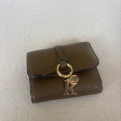 Bruine portemonnee, som rapportert til iLost