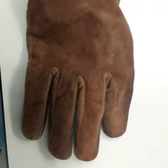 Roupa - handschoen, como reportado por Regio West-Vlaanderen utilizando o iLost