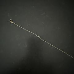 Gouden armbandje met blauwe steen, como reportado ao iLost