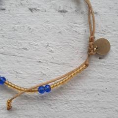 Armband Goudkleurig blauw, zoals gemeld door DierenPark Amersfoort met iLost