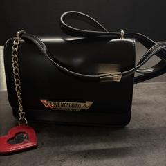 Zwarte handtas, como reportado ao iLost