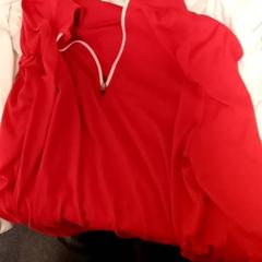 Shirts 2 white long sleeves, 1 red long sleeve, as reported by Mövenpick Hotel Amsterdam City Centre using iLost