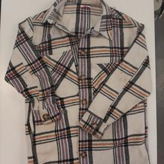 Jasje beige zwart oranje geruit, iLost를 사용하여 Avonturenpark Hellendoorn에 보고됨