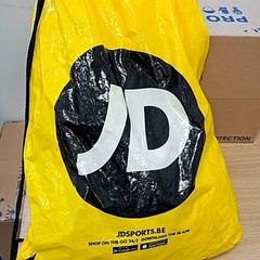 Bolsa wit en zwart, JD, ha sido reportado por Regio Antwerpen - Brussel con iLost