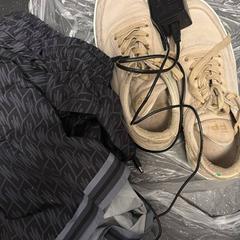 Shoe laptop charges and shorts, as reported by Ramada by Wyndham Amsterdam Airport Schiphol using iLost