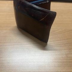 Carteira J. Highberger, como reportado por Connexxion Amstelland-Meerlanden Schiphol Noord utilizando o iLost