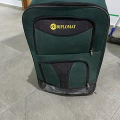 Wheeled suitcase اخضر, as reported by محطة بريدة (بريدة) using iLost