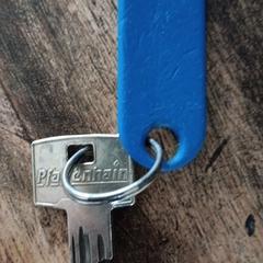Sleutel met een blauw label, segundo informou a iLost