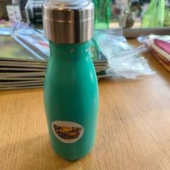 Fľaša blauw met sticker, ako bolo nahlásené Hortus pomocou iLost