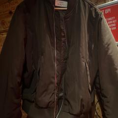 Jacket, as reported by Club Nyx/Exit Café using iLost