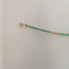 Armband Perle verte et dorée, gemeldet von IKEA Clermont Ferrand über iLost