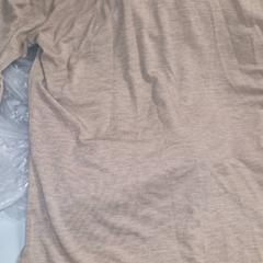 Lange tshirt beige, rapporterat av DoubleTree by Hilton Rotterdam Centre med iLost