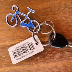 Fietssleutel met label en racefietsje, ako bolo nahlásené iLost