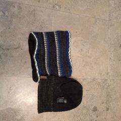 Cap Bruin met nekverwarmer, come riportato da Regio West-Vlaanderen utilizzando iLost