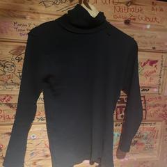 Black turtleneck, as reported by Club Nyx/Exit Café using iLost