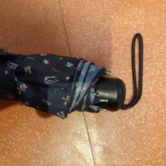 Paraigües plegable bleu marine, segons ha informat TCL mitjançant iLost