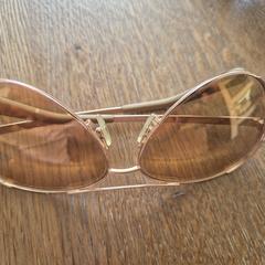 Michael Kors zonnebril rose, amint azt az iLostnak jelentették.