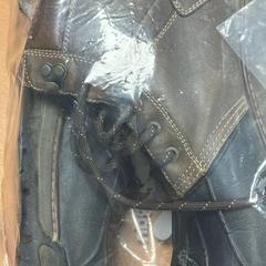 Botas bottes, segundo informou Sheraton Brussels Airport Hotel usando iLost