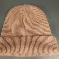 Vestiario Beige muts, come riportato da Centraal magazijn utilizzando iLost