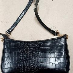 Handtasje, zoals gemeld door Qbuzz GD Groningen Peizerweg met iLost