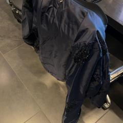 Veste Donkerblauw glitter, a été signalé par Van der Valk Hotel Houten utilisant iLost