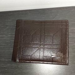 Portemonnee bruine VANVLASSELAER, segons ha informat Centraal magazijn mitjançant iLost