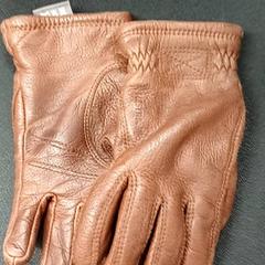 Guant Leer bruin, segons ha informat Qbuzz GD Groningen Peizerweg mitjançant iLost