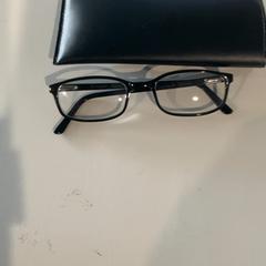 Glasses case with glasses, as reported by Cincinnati Tennis LLC using iLost