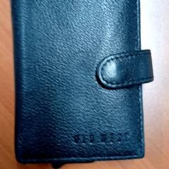 Kaartenhouder Kemaldar, a été signalé par Centraal magazijn utilisant iLost